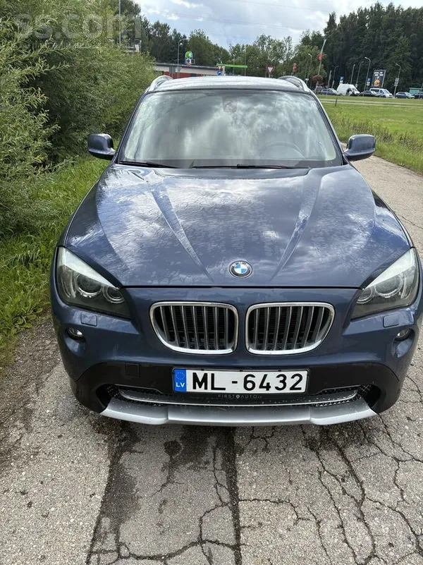BMW X1 2011, 2.0D dīzelis, Automāts, Hečbeks, Zils — Latvijā
