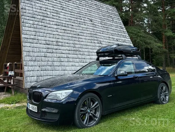 BMW 740 2011, 3.0D dīzelis, Automāts, Sedans, Zils — Latvijā